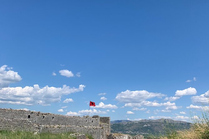 3-Day North Albania: Kruja, Theth, Blue Eye, Shkoder Shala River - Theth in the Albanian Alps: church, tower, and a real mountain feel