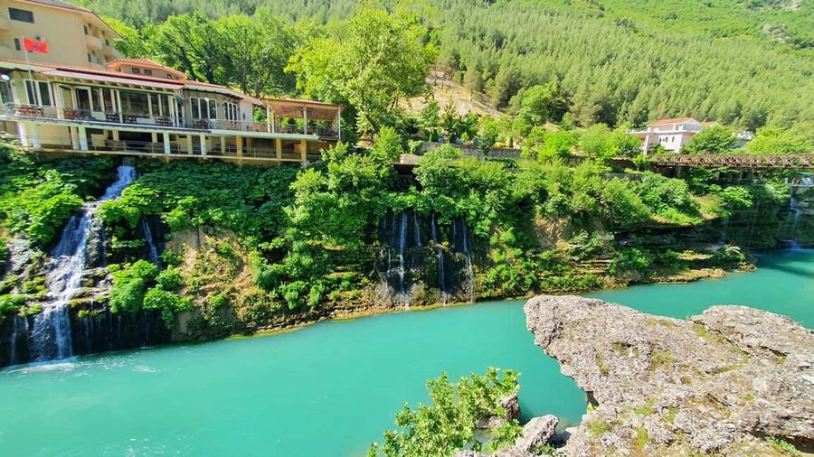 A Day in Permet: Swim in Thermal Baths and Langarica Canyon - Benja Natural Hot Baths: soaking, swimming, and mountain views