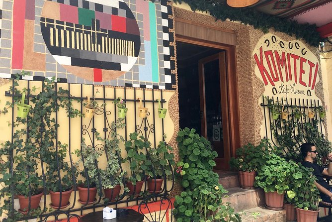 Best of Local Food & City Tour of Tirana - Food & Drinks Included - The 100% Made in Albania shop: jams, cheese, herbs, and raki tastings