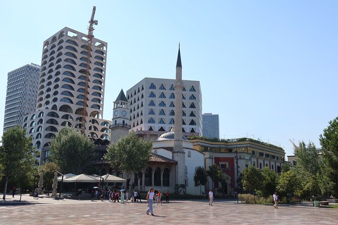 Best of Tirana Walking Tour – History, Bunkers & Local Life - Skanderbeg Square: starting with identity and power