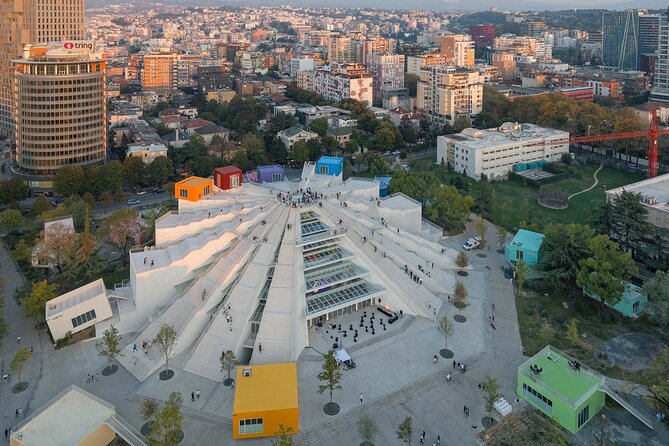 Bike Tour Tirana - 3 Times a Day - VisitAlbCom - Meeting at New Bazaar and the first roll through local life