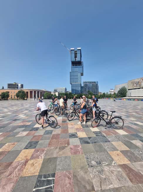 Bike Tour Tirana Highlights - Skanderbeg Square: the big-name centerpiece and why it matters