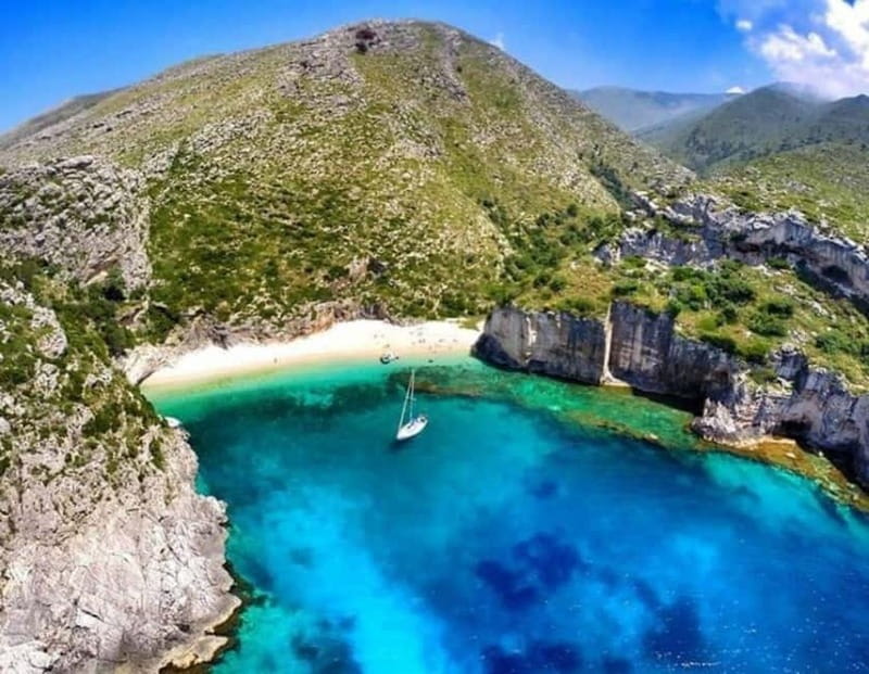 Boat Trip Vlore: Haxhi Ali Cave & Saint Jan Beach - The Haxhi Ali Cave stop: photos, then a guided visit