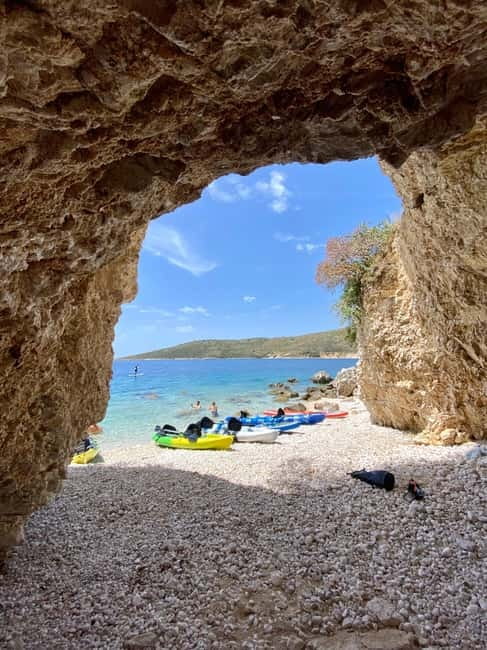 Caves of Porto Palermo: Kayak/SUP Tour with Castle Sea View - The first leg: emerald water, caves, and calm momentum