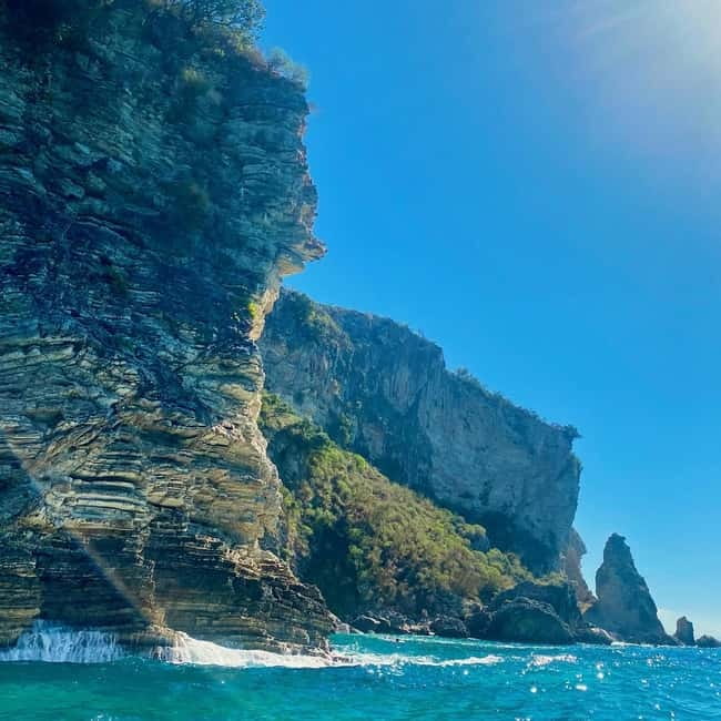 Caves of Porto Palermo: Kayak/SUP Tour with Castle Sea View - First secluded beach stop: swim and snorkeling for about 30 minutes