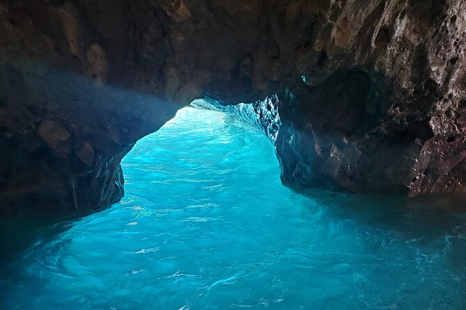 Dhermi: Boat tour of the coast to Filikuri beach - Couple Bay and the Secret Cave: the calmer swim option