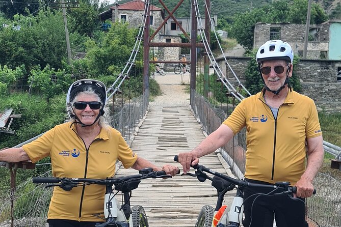 Electric Mountain Bike in Vjosa River Albania - Petran fir tree, forest, and Petran rock stops