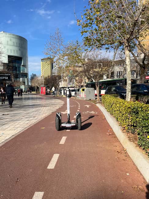 Explore Tirana by Segway: History & Culture with Local Guide - House of Leaves Museum area: a darker pause on a light ride