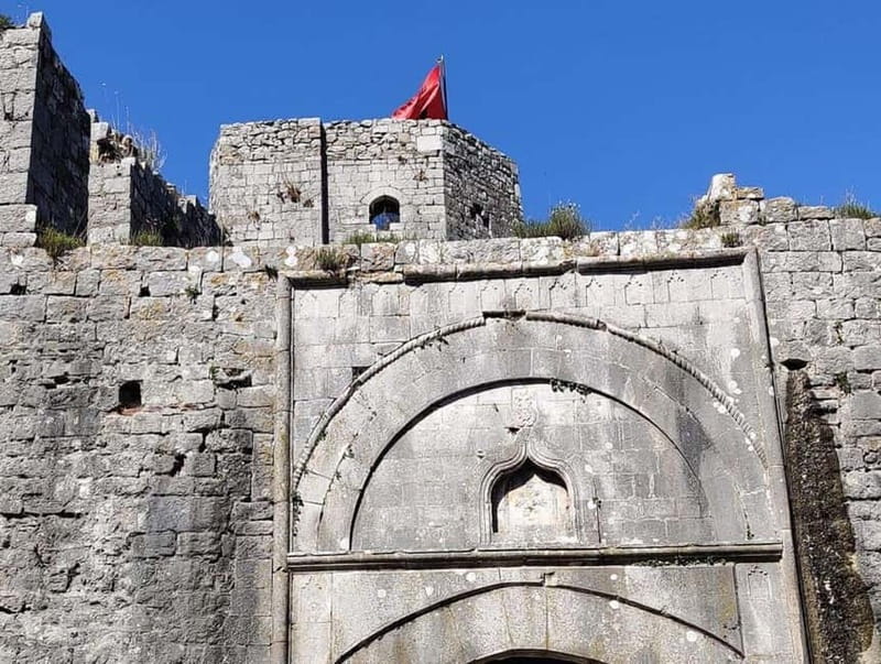 From Tirana: Kruja Castle & Sarisalltik Day Tour - Old Bazaar of Kruja: cobbled streets and craft shopping with breathing room