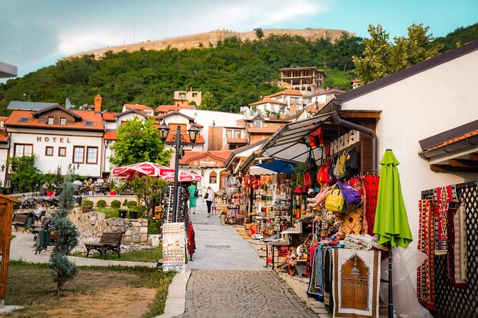Full Day Tour from Tirana to Prishtina and Prizren - Prishtina walking stops: from the National Library to Mother Teresa and Clinton