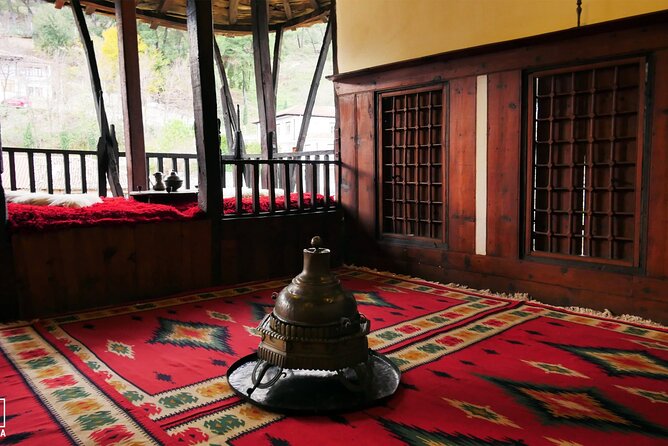 Full Day Tour in Belsh Lake and Berat Town from Tirana - Berat Castle: cobblestone streets, lived-in houses, and mountain views