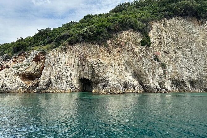 Group Tour From Saranda to Krorez Free Drink Umbrella - Kakome Bay: a calm pause for swimming and relaxing