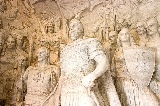 Guided Tour to Kruja, Holy Mountain & Old Bazaar from Durres - Fushë-Krujë: Bush Statue, Bakery Stops, and Artisan Studio Time