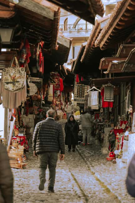 Kruja by Night: Castle & Bazaar Tour from Tirana - What to bring and wear: cobblestones, cameras, and a simple packing list