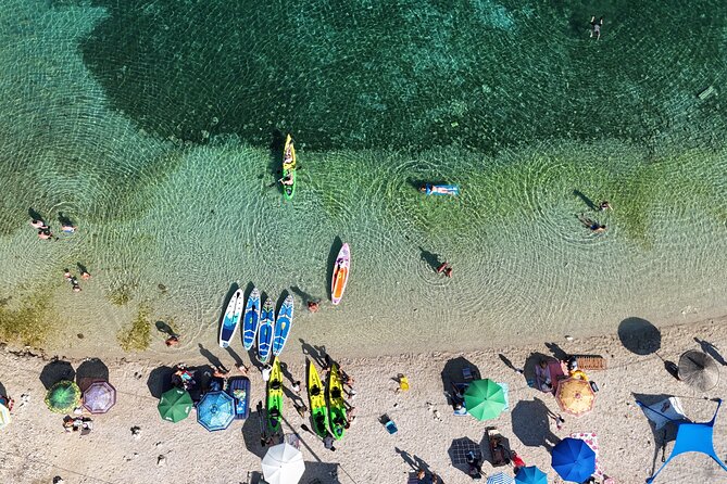 Porto Palermo Bay Kayak and SUP Tour with Transfers - Snorkeling gear and waterproof phone kit, and how to use it well