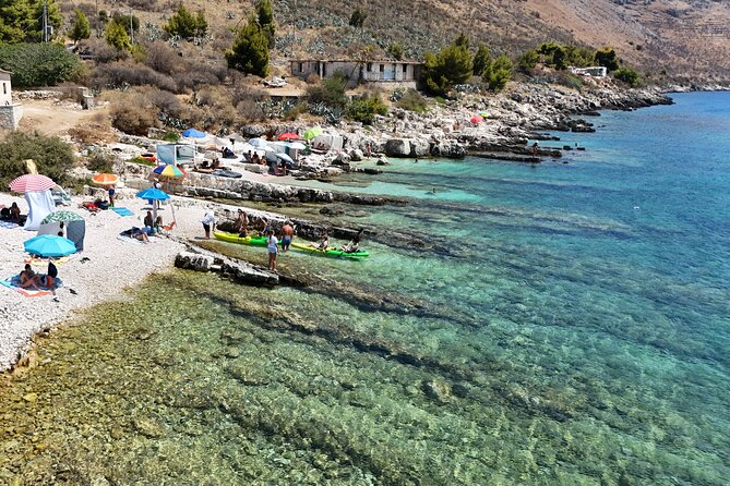 Porto Palermo Bay Kayak and SUP Tour with Transfers - What’s included for $54.44, and what you should bring