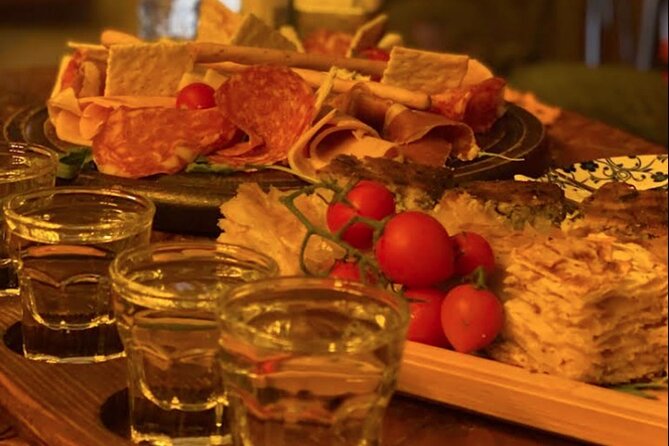 Raki Tasting and Meze Pairing in Vlora - Raki tasting in Vlora with Arbri and a meze table