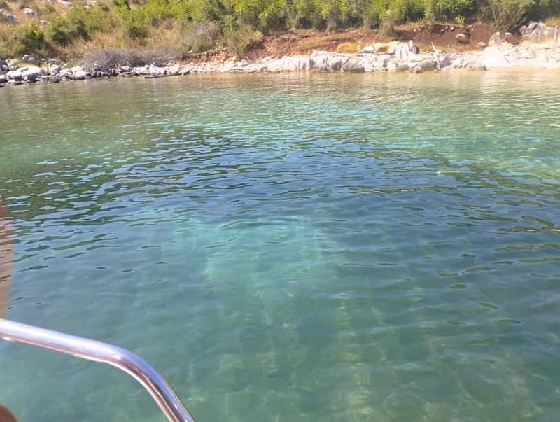 Saranda: Private Boat Tour with Swimming and Beach Time - Snorkels, umbrellas, and small gear details that matter