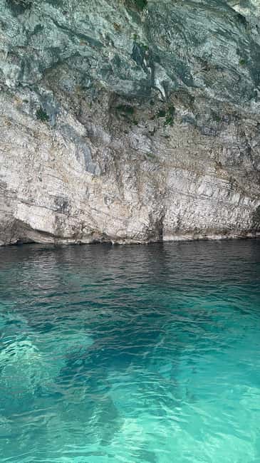 Sarandë Seascape: Coves, Cliffs & Caribbean-Blue-Water Bays - Kakome Beach: Cliffs, Quiet Water, and Real Shore Views