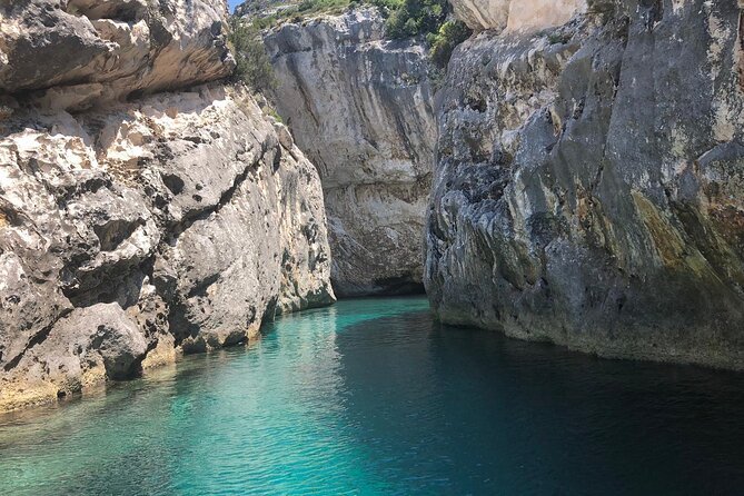 Secret Blue Gem Cave & Grama Bay Boat Tours Vlore - Haxhi Ali Cave area and the long coastal sweep