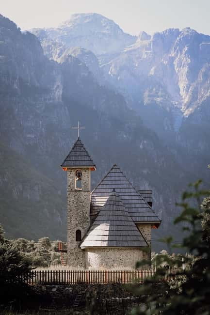 Shkoder: Theth National Park Day Tour with Local Guide - Pickup, the Van Ride Through the Albanian Alps, and Stops at Boge and Qafa Thores