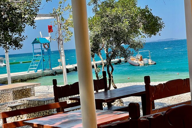 Speed Boat Trip to Haxhi Ali Cave and Karaburun Beach - Beach time at Karaburun: swimming, shade, and the restaurant reality
