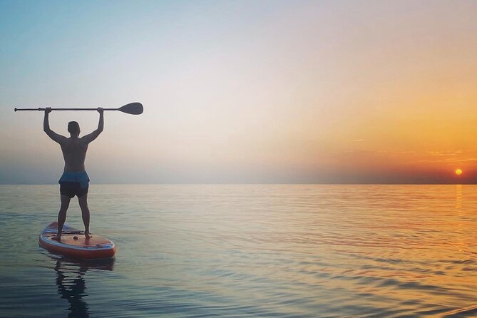 Sunset kayak/Sup tour - Lukova caves and Secret beaches - Stop 4, heading back to Shpella Lukove with the coastline in fading light