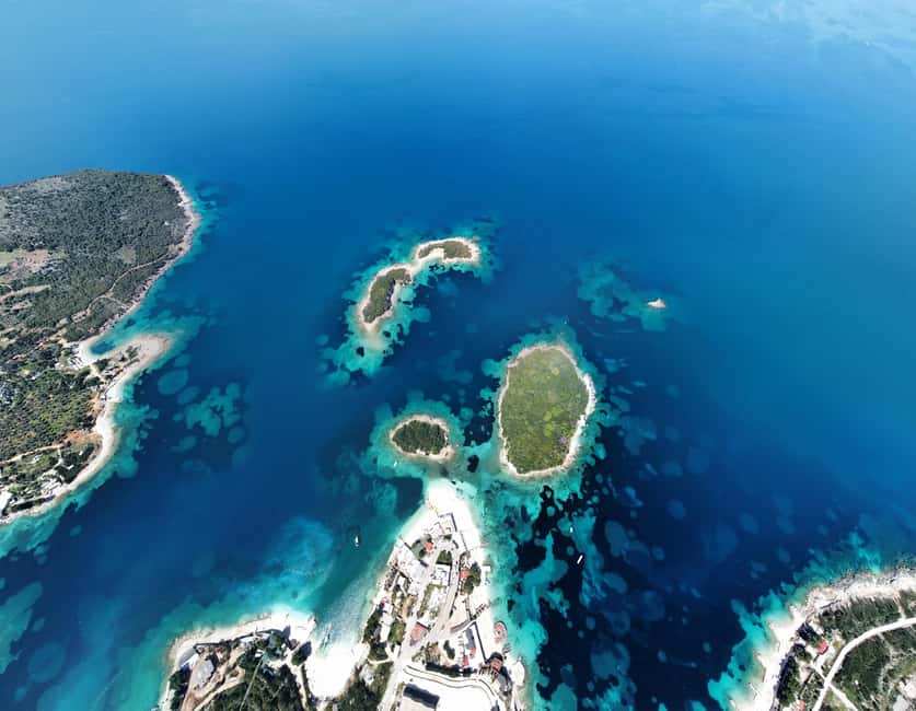 Sunset Sailing to Ksamil Islands with Fruits and Drinks - Sailing the Ksamil Islands: the first 10 minutes set the tone