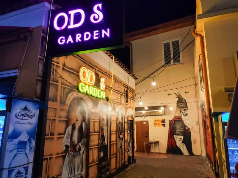 "Tirana After Dark: Nightlife Tour & Local Drinks" - Tirana Castle after dark: stone walls, warm lights, easy wandering