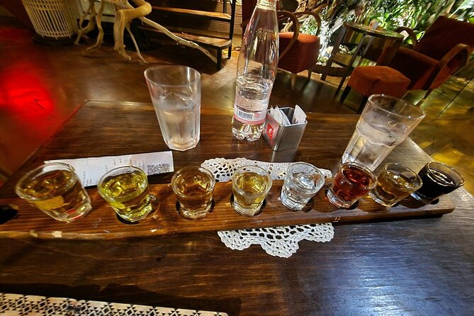 Tirana Beer, Wine and Raki Tour with Food Inclusions - Cafe Museum raki stop: the spirit sampler moment