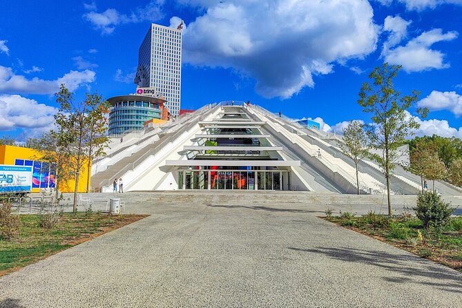 Tirana Bike Tour, History, Culture and Visit to Artificial Lake - Brigades Palace on weekends: King Zog, Queen Geraldine, and monumental rationalism