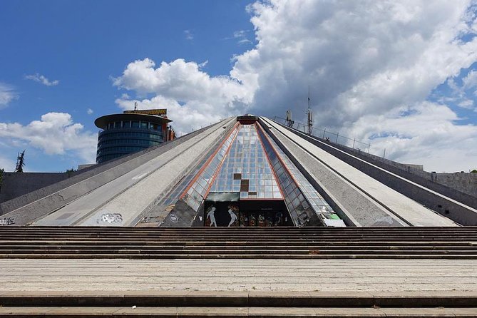 Tirana by locals - Enver Hoxha Pyramid: communist power, left with contradictions