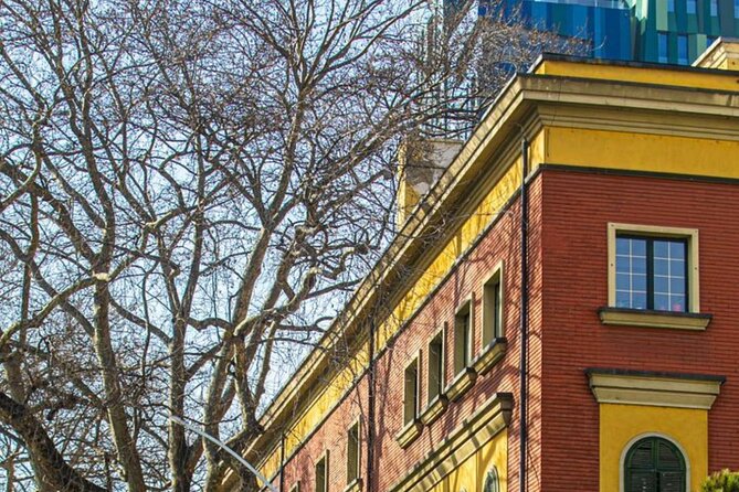 Tirana Center Walking Tour - Mother Teresa Square, government buildings, and the Orthodox Cathedral