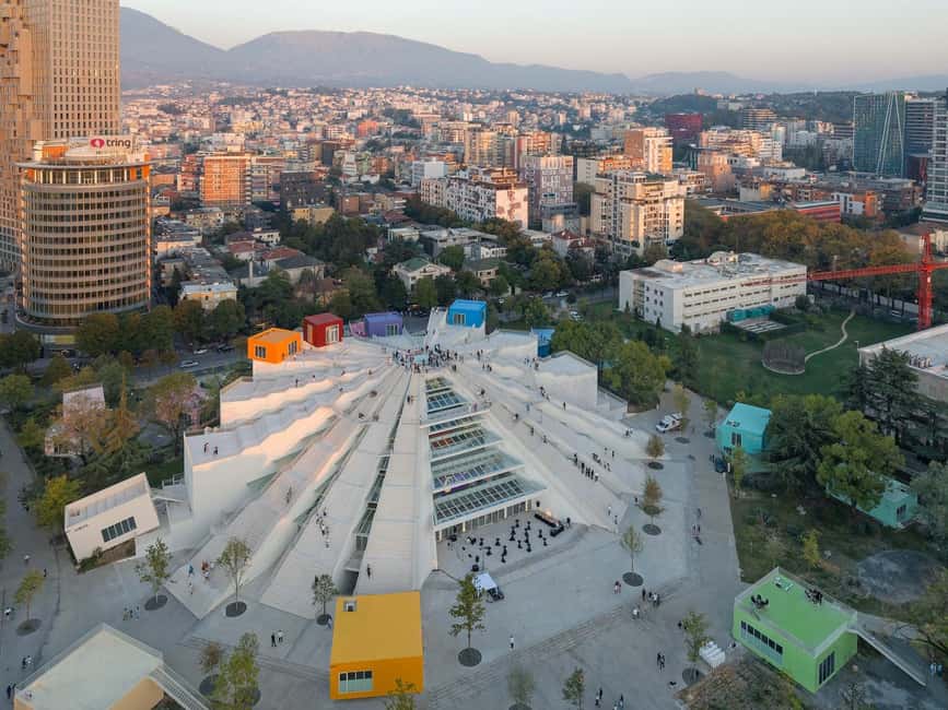Tirana Evening & Night Walking Tour History and Architecture - Tirana at Night: Statues, Bunkers, and Rooftop Views