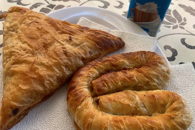 Tirana Guided Street Food Gems Tour (6 dishes, 1 sweet and drink) - Parliament Area and Tanners’ Bridge: Pispili Plus a Historic Walk