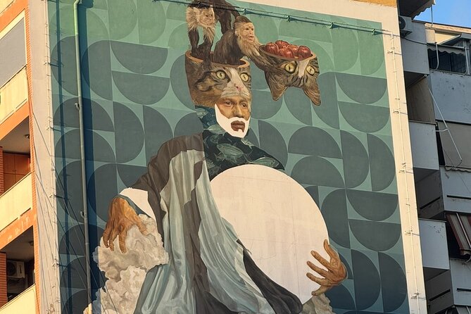 Tirana Mural Bike Tour: Street Art, Culture & Photography Stops - DOG and Mots at DOG - Mots, beside Kesulekuqja