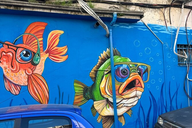 Tirana Mural Bike Tour: Street Art, Culture & Photography Stops - Rocket01’s nature meets technology mural, and why you slow down anyway