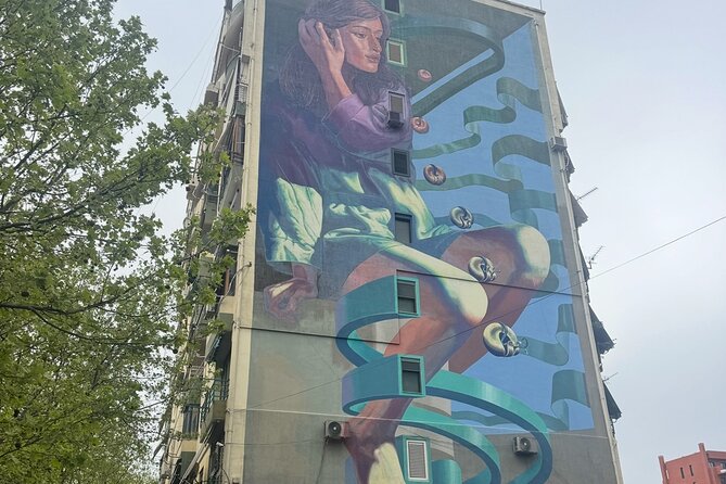 Tirana Mural Bike Tour: Street Art, Culture & Photography Stops - Reja The Cloud: Sou Fujimoto’s white steel and your first big photo contrast