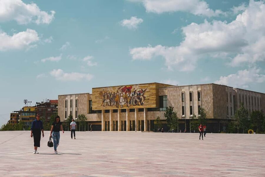 Tirana’s Communist Past; Small Group Walking Tour - Skanderbeg Square: where the public script changed