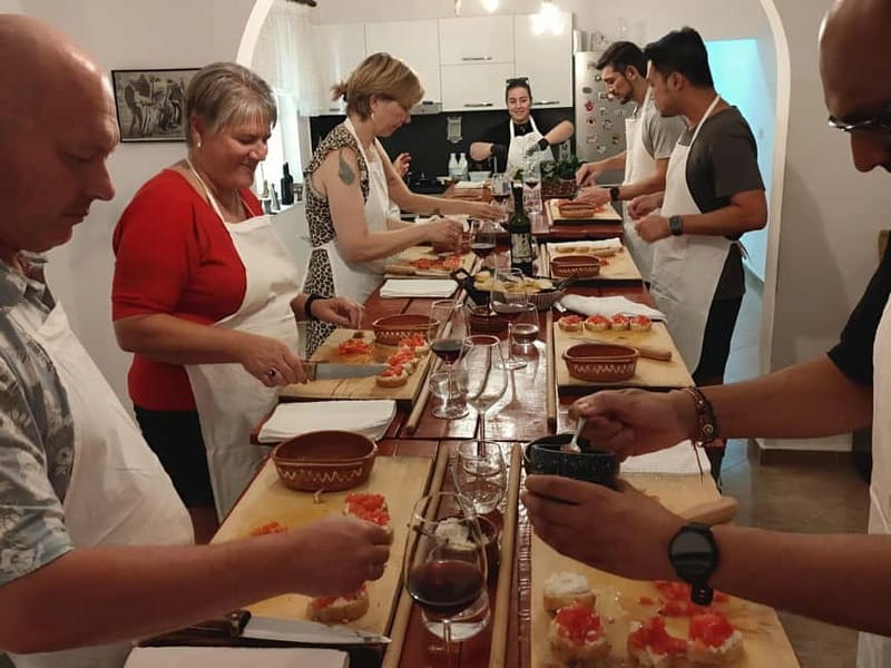 Tirana: Traditional Cooking Class with Wine & Raki Tasting - Entering the Tirana Kitchen: Tave Kosi and Lakror Matter