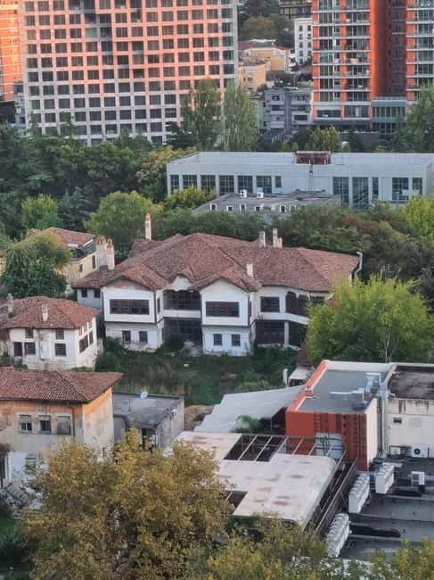 Tourana - Discover Tirana with a local - Boulevard of Martyrs, Pyramid, and the Block: reading the communist-era imprint