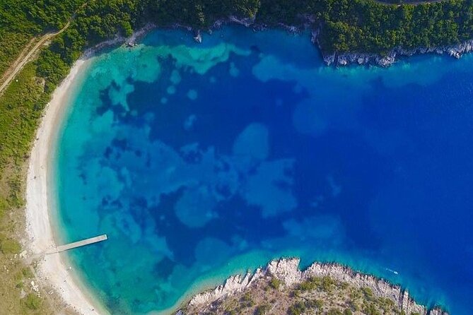 Visit Kroreza Beach by Boat - The beach experience at Kroreza: swimming, views, and the pebble reality