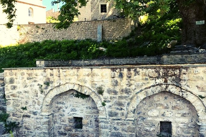 Visit the Mosque of Gjin Aleksi and the Islamic Complex of Xhermehalla - Islamic Complex of Xhermehalla in Delvinë: mosque, hammam, and the 17th-century mezzanine