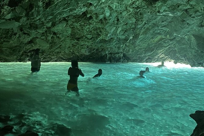 Vlora Boat Trip To Secret Blue Gem Cave & Grama Bay - Stop 1: Haxhi Ali Cave and that first cave-water moment