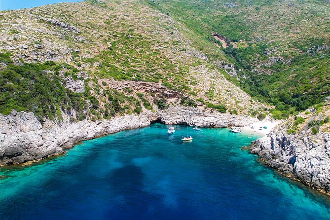 Vlore: Dafina Bay and Haxhi Ali Cave Private Speedboat Tour - Dafina Bay beach time: swimming, snorkeling, and that calm-water feeling